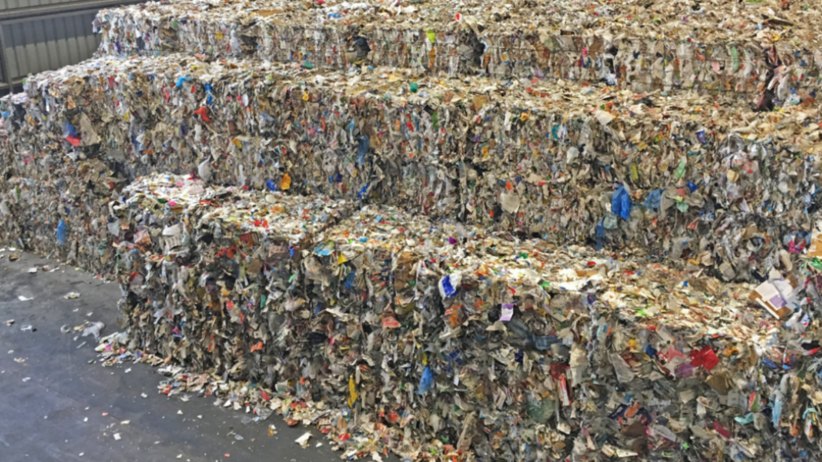 Giant blocks of post consumer waste. As of 2018, less than 9% of the plastic produced was recycled.